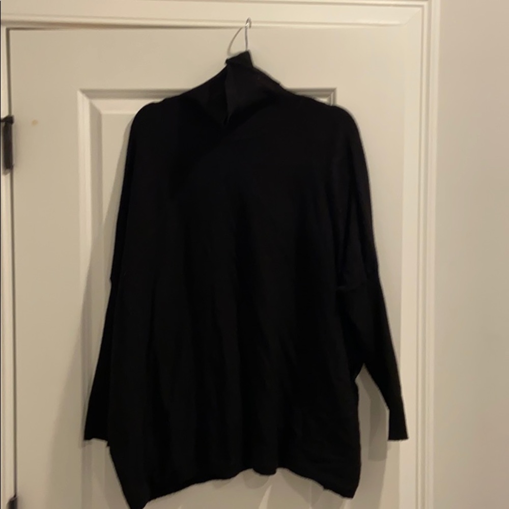 Black slouchy turtleneck sweater